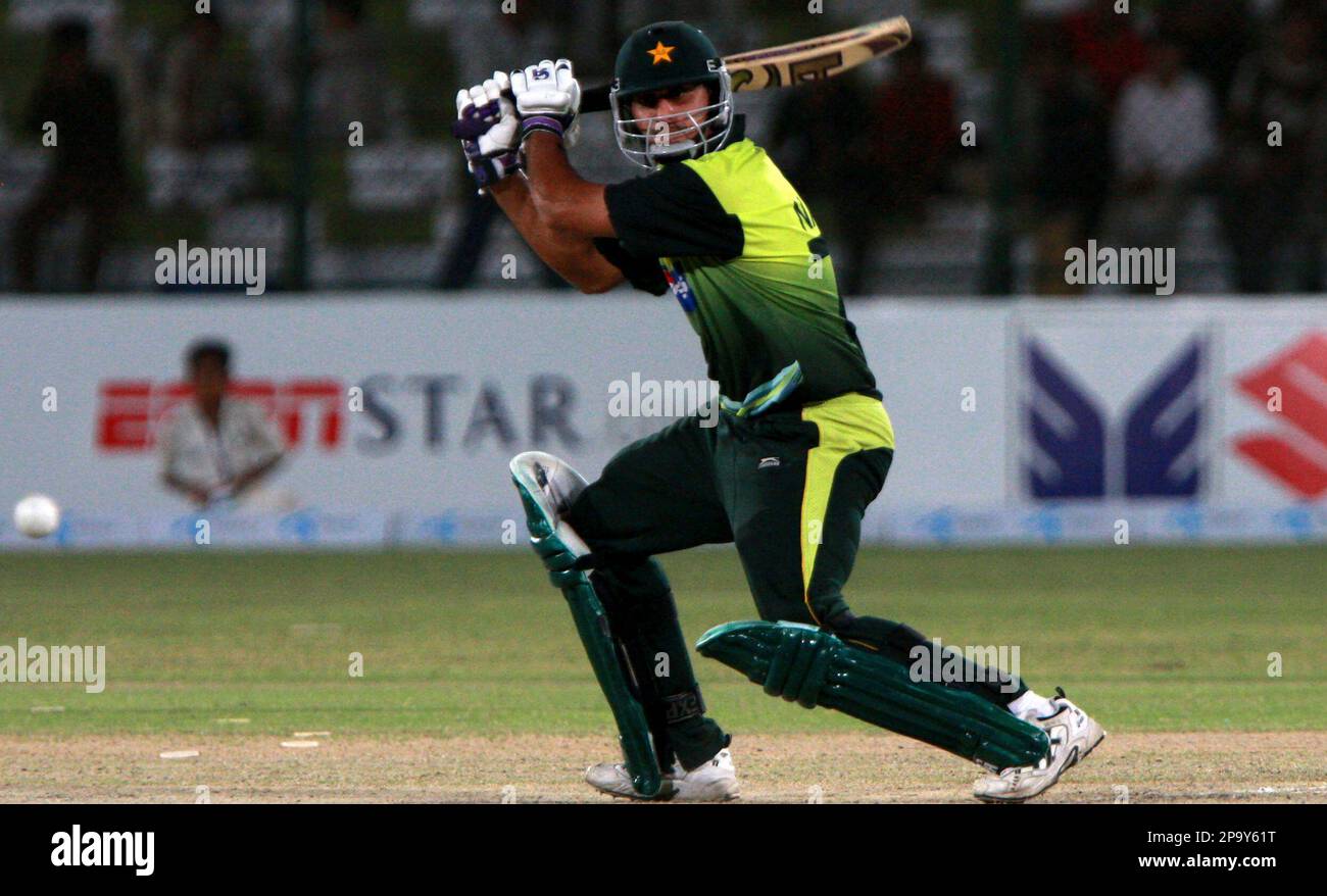 Pakistani batsman Nasir Jamshed plays a shot for boundary against India