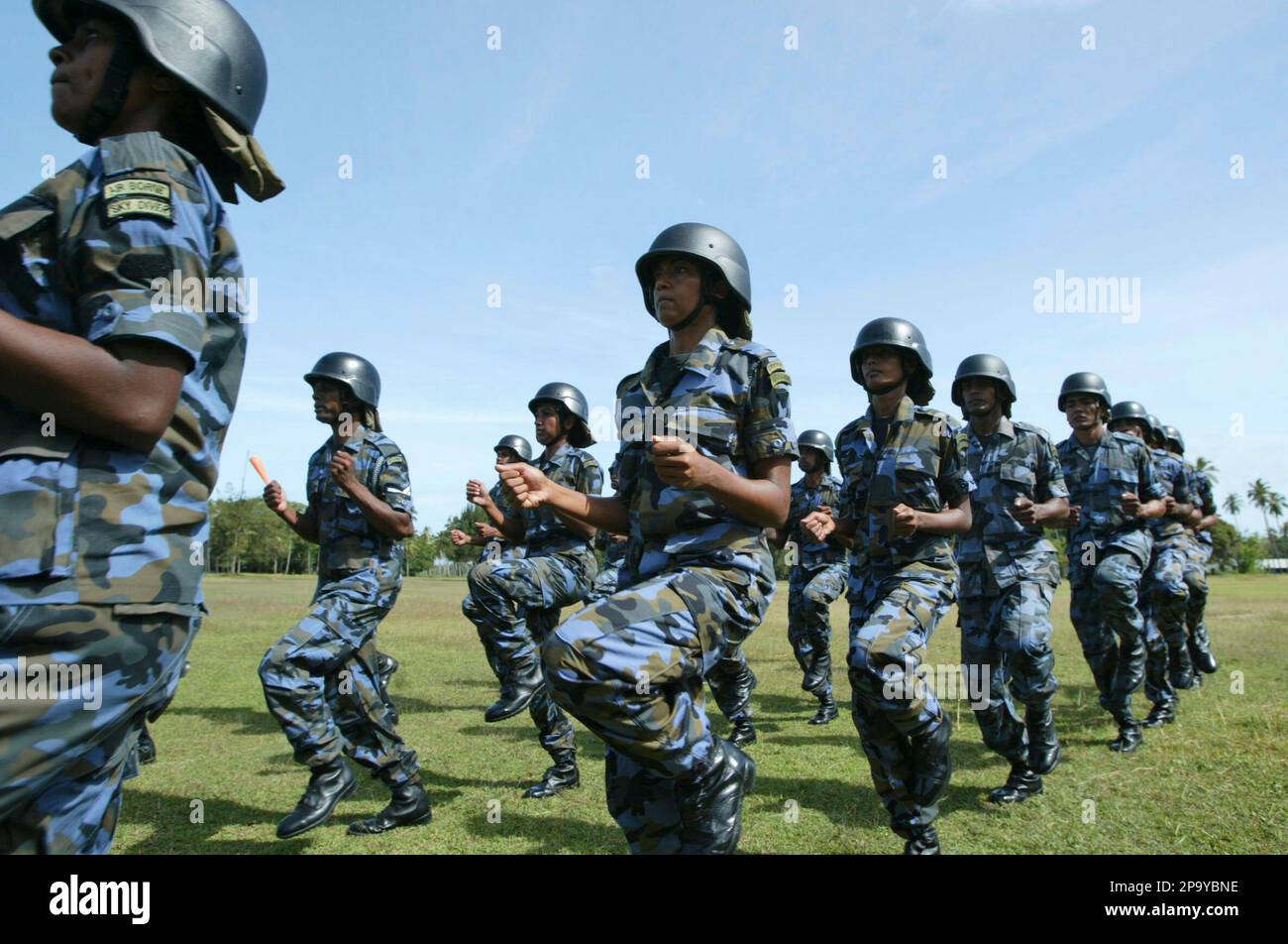 Sri Lankan Air Force women march during a passing out ceremony of