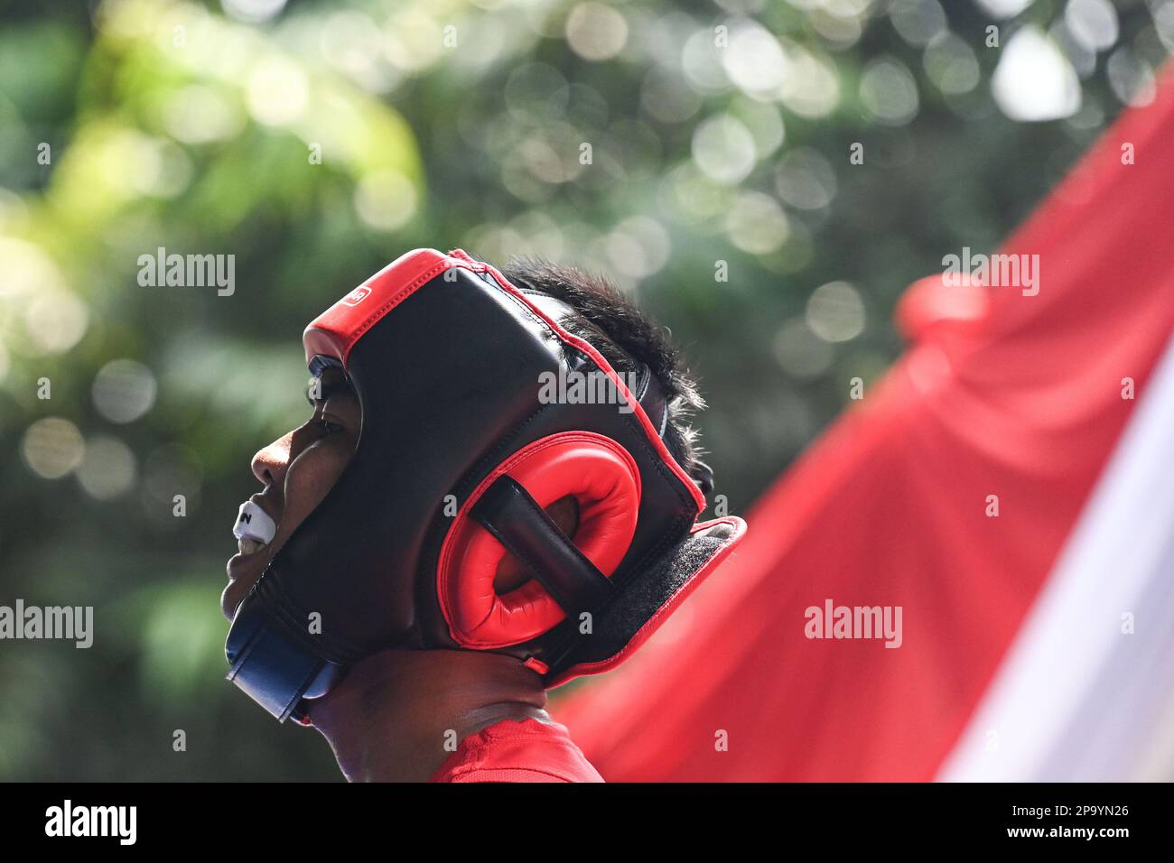 Jakarta, Indonesia. 11th Mar, 2023. An amateur boxer prepares before