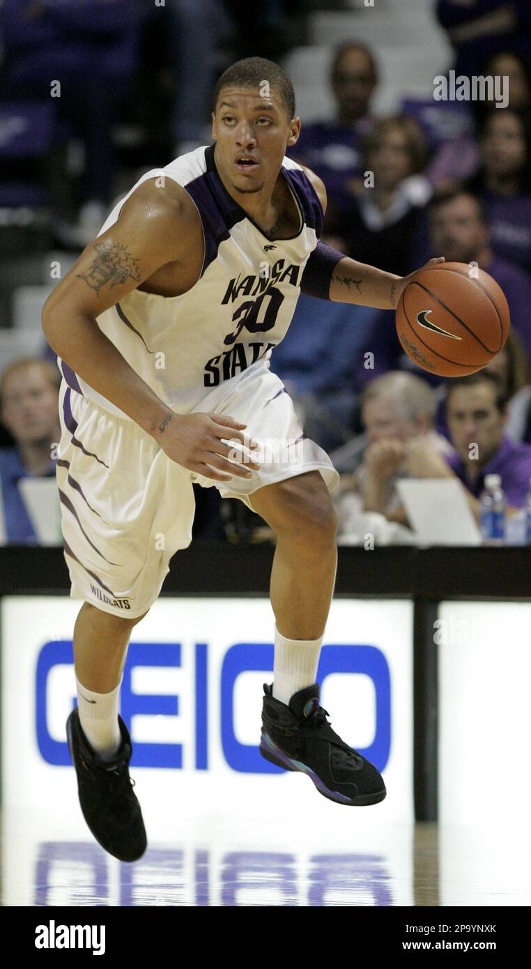 FILE In this Nov. 17 2007 file photo Kansas State forward Michael Beasley drives during a college basketball game against Western Illinois in Manhattan Kan. Derrick Rose or Michael Beasley