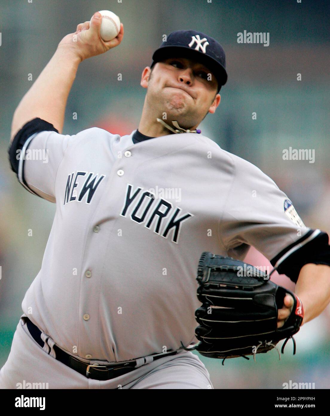 New York Yankees pitcher Joba Chamberlain delivers in a baseball game