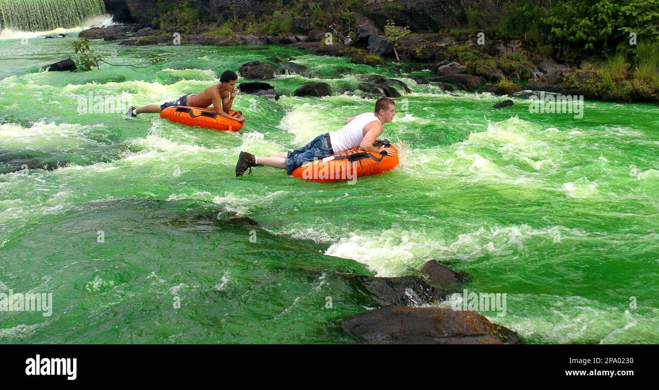 Mike Davis, left, and Adam Booker of East Stroudsburg, Pa., take a run