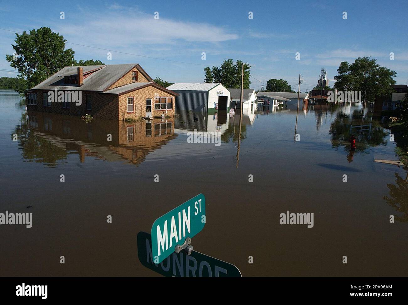 The Mississippi River meanders through Main Street in downtown LaGrange, Mo., Saturday, June 21