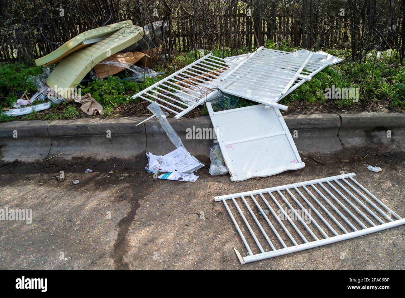 Denham, Buckinghamshire, UK. 11th March, 2023. Foam and a child's cot fly-tipping next to a lay-by in Denham. Credit: Maureen McLean/Alamy Live News Stock Photo