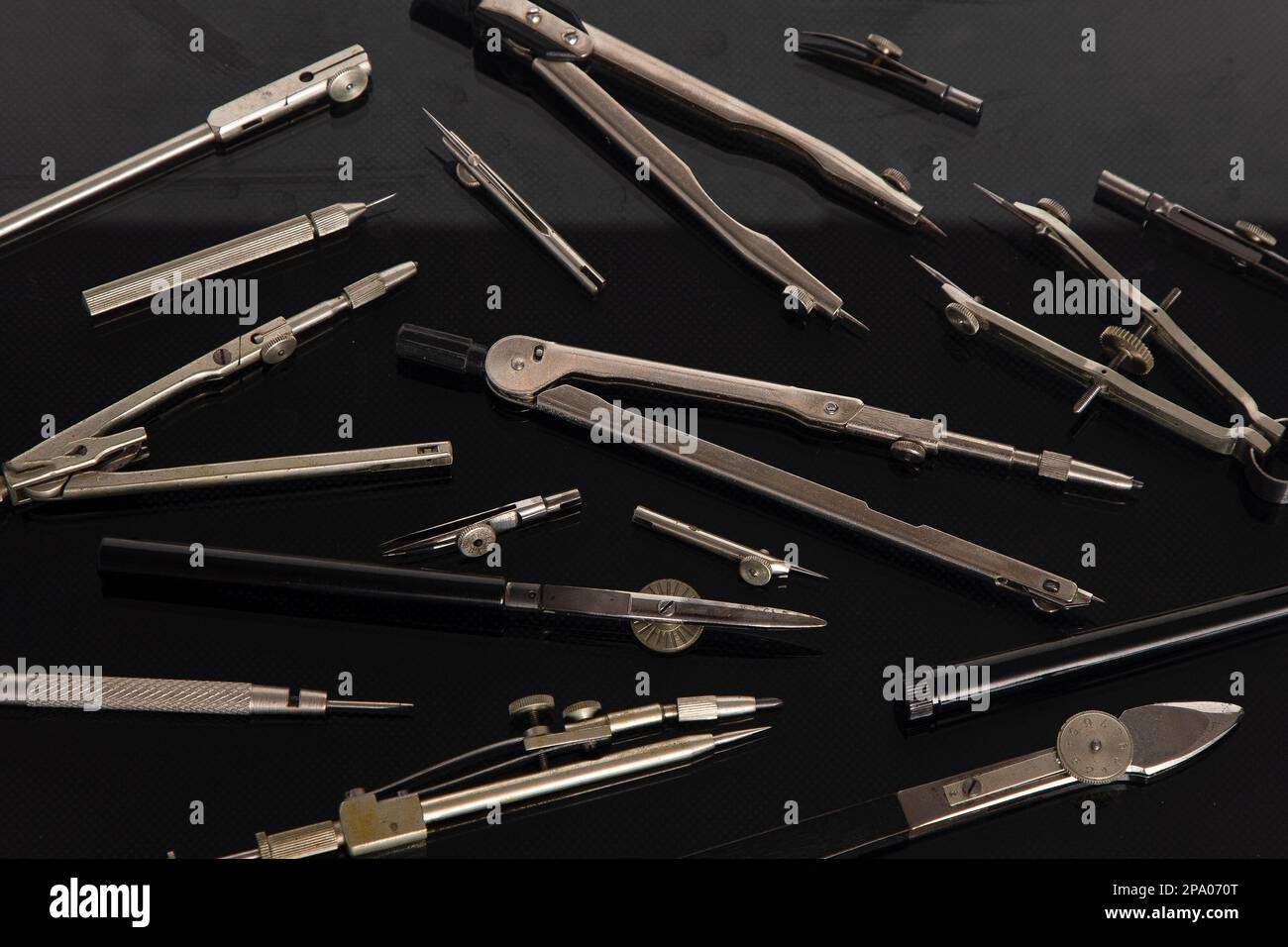 Compass for drawing. Set of old different compasses. Retro metal