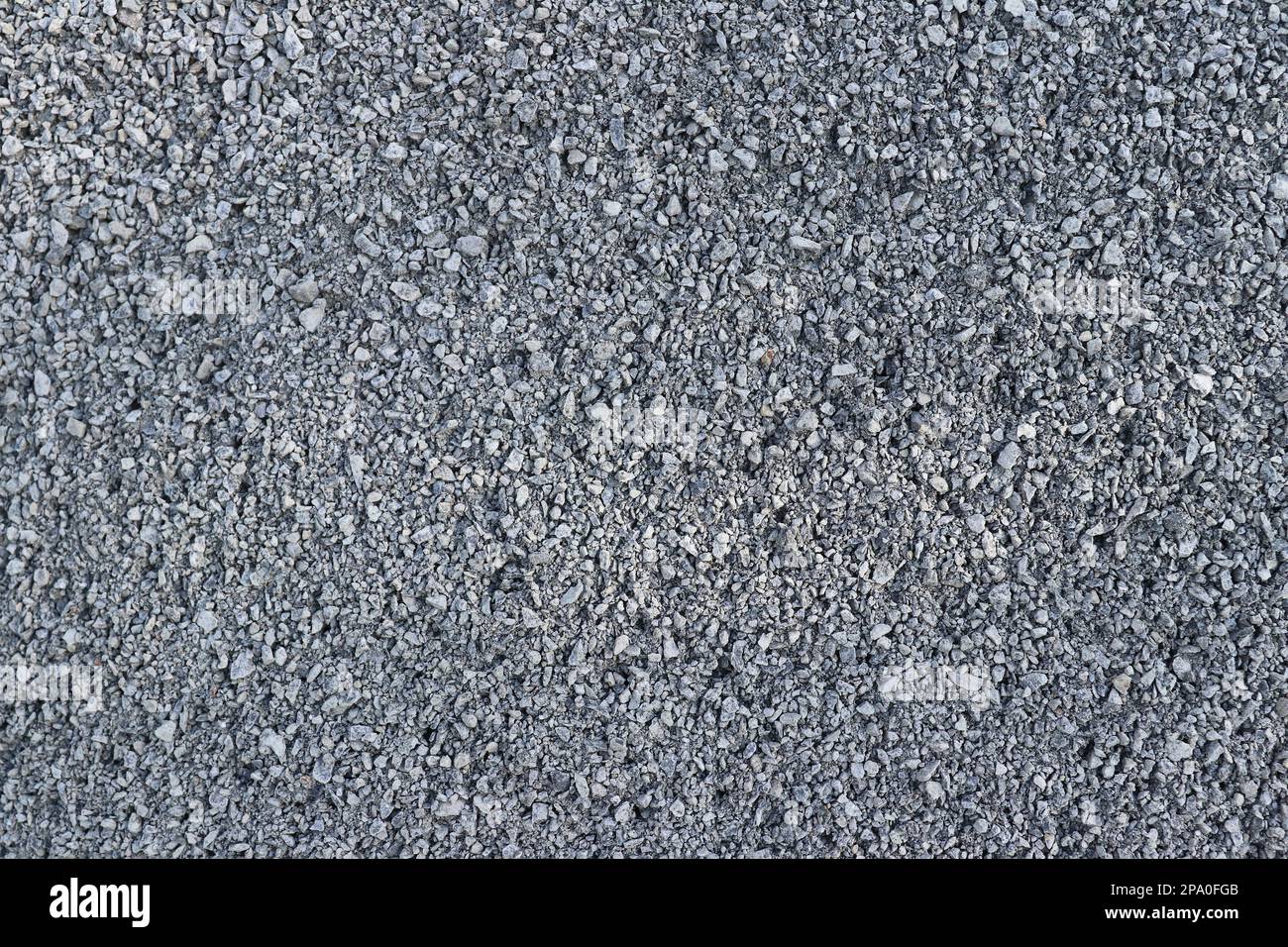 Fine to medium coarse gravel - texture of the road surface Stock Photo