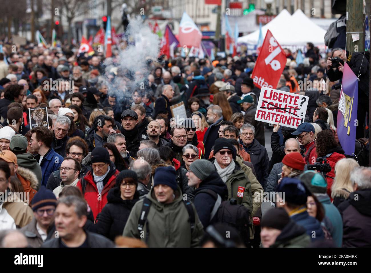 Demonstrators march against the government's pension reform plan in Paris, France, March 11, 2023. REUTERS/Benoit Tessier Stock Photo