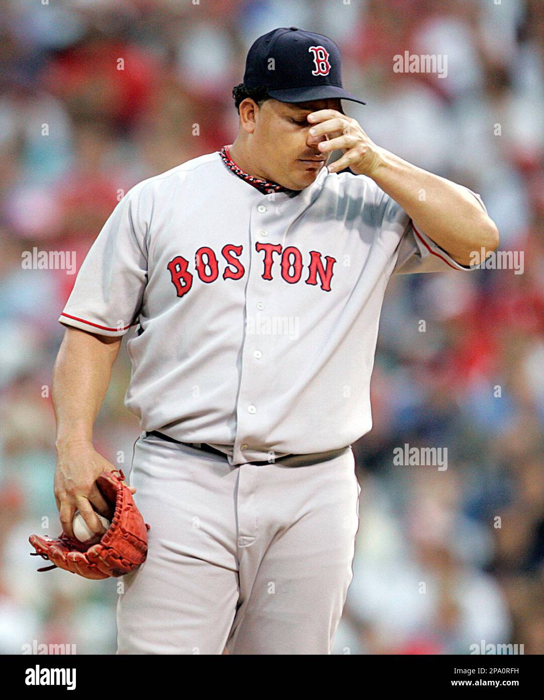 Boston Red Sox' Bartolo Colon reacts after giving up three runs in