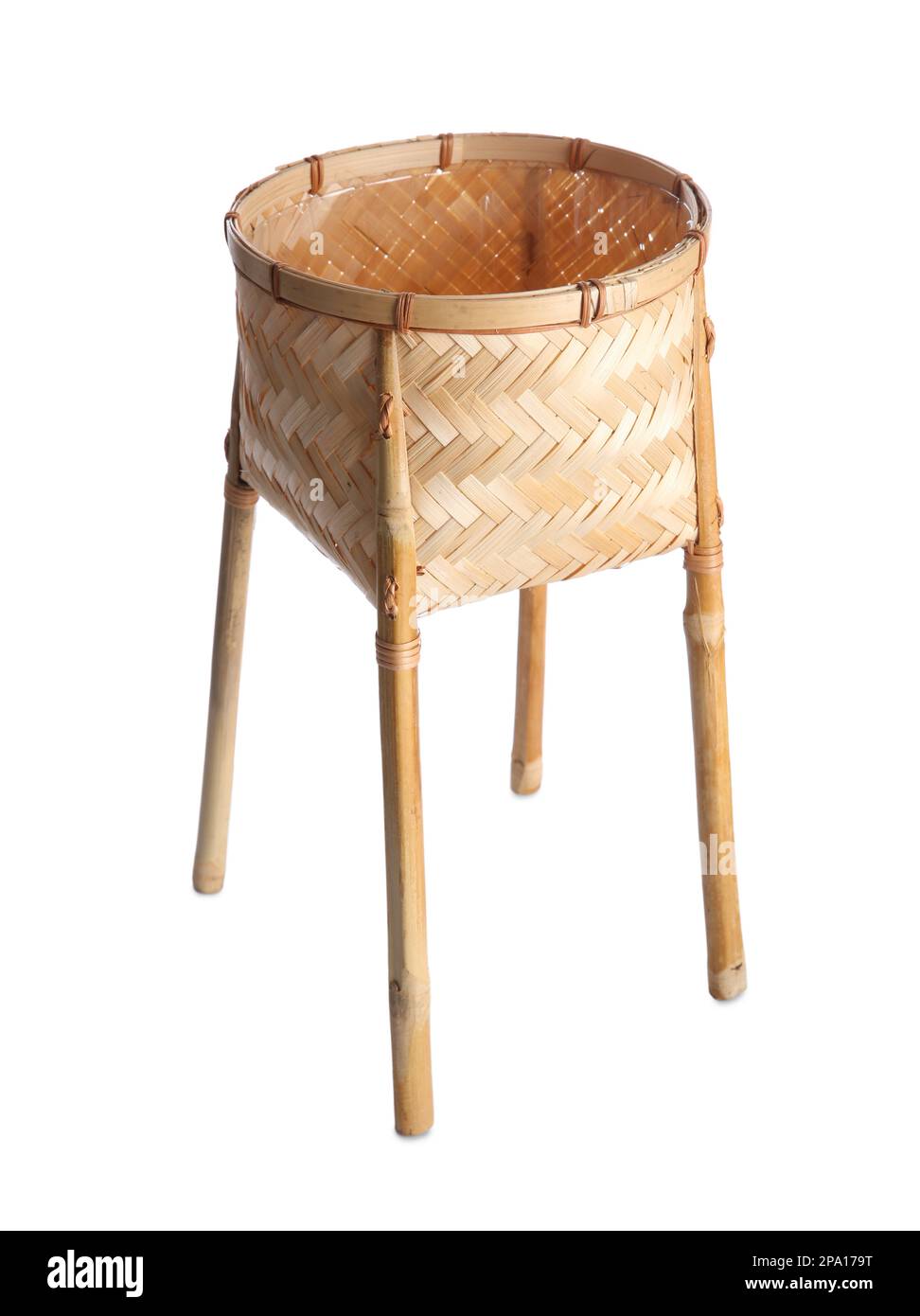 Empty wicker plant stand isolated on white. Interior accessory Stock Photo