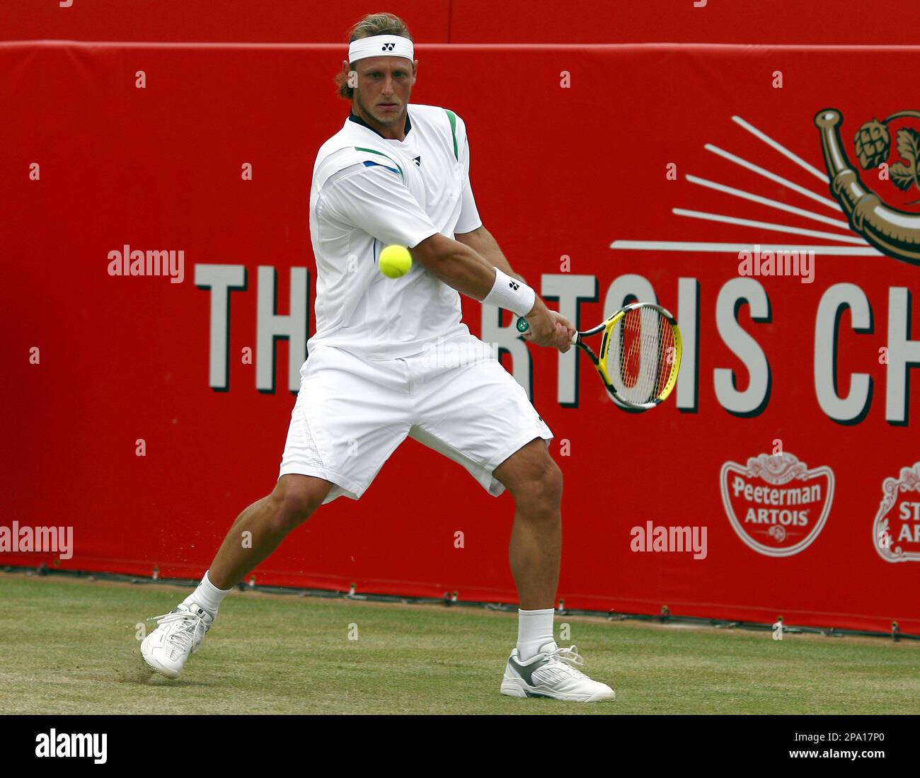 Nabladian Racket Argentina's David Nalbandian returns a ball to France's Richard Gasquet ...