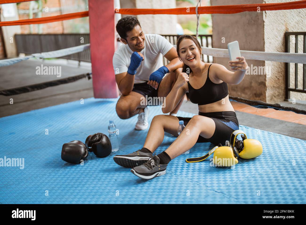 a female boxer and the male boxer taking groufie photo Stock Photo