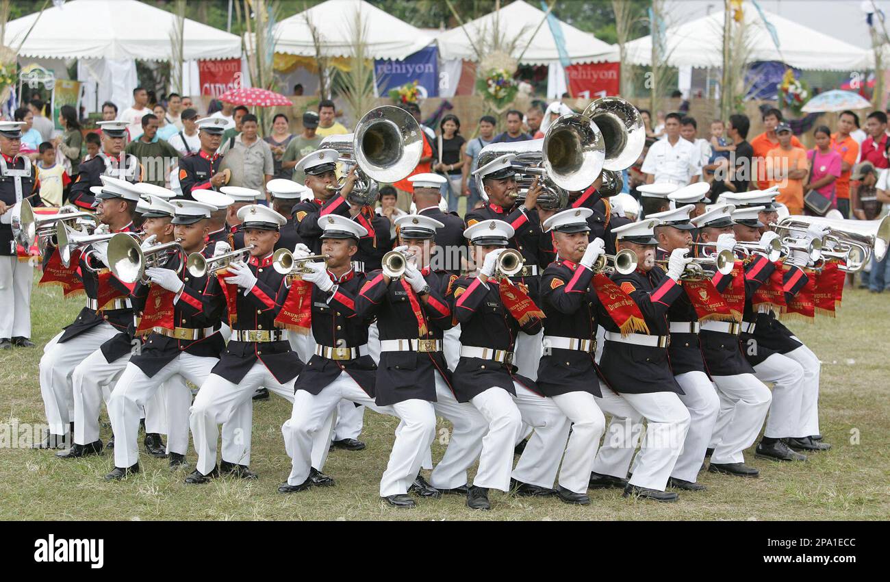 Members of the Philippine Marines Drum and Bugle Corps perform during