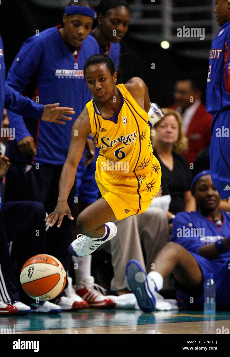 Los Angeles Sparks' Shannon Bobbitt attempts to keep the ball in bounds ...