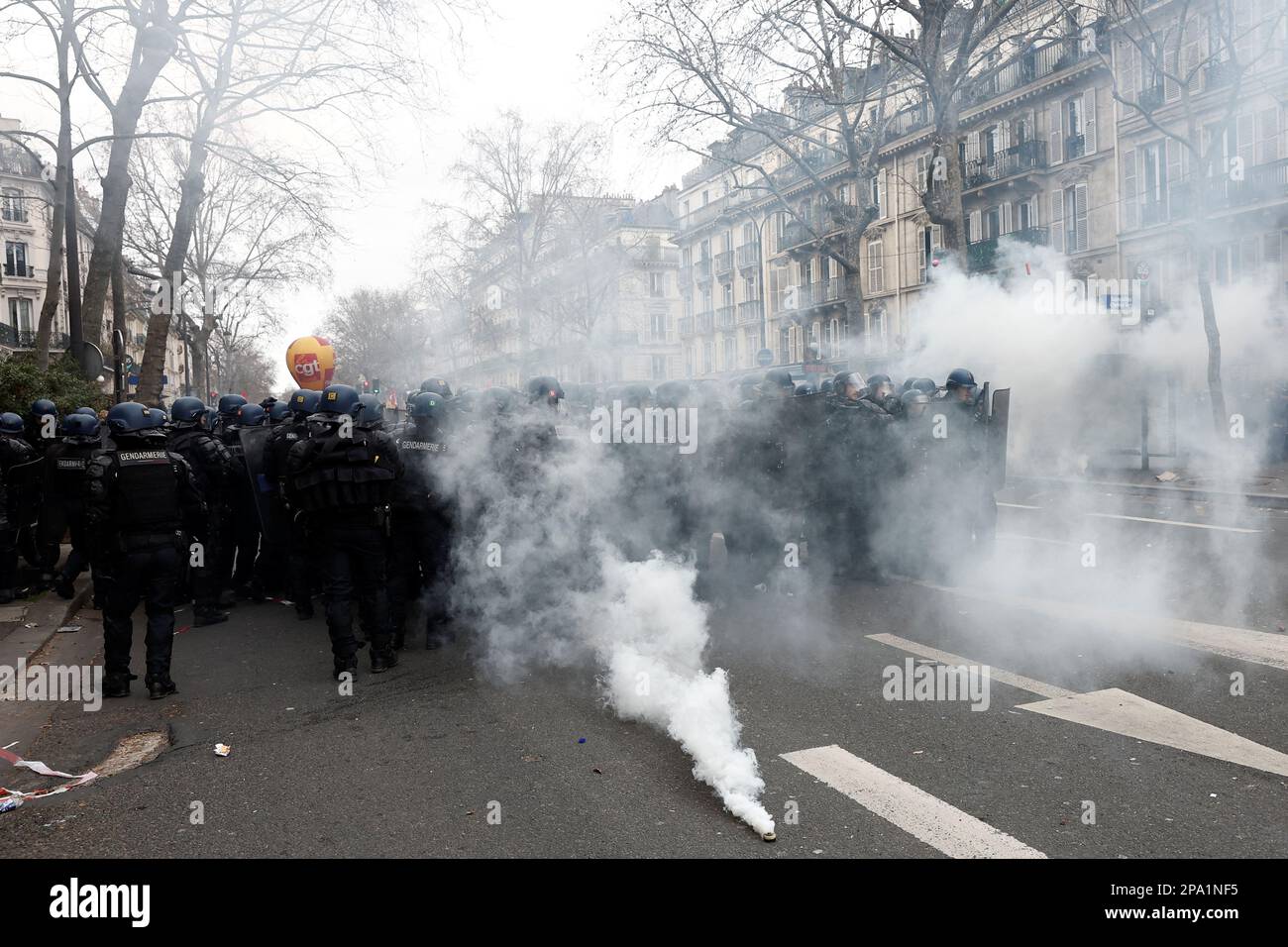 Riot police move in and fire tear gas as demonstrators march against the government's pension reform plan in Paris, France, March 11, 2023. REUTERS/Benoit Tessier Stock Photo
