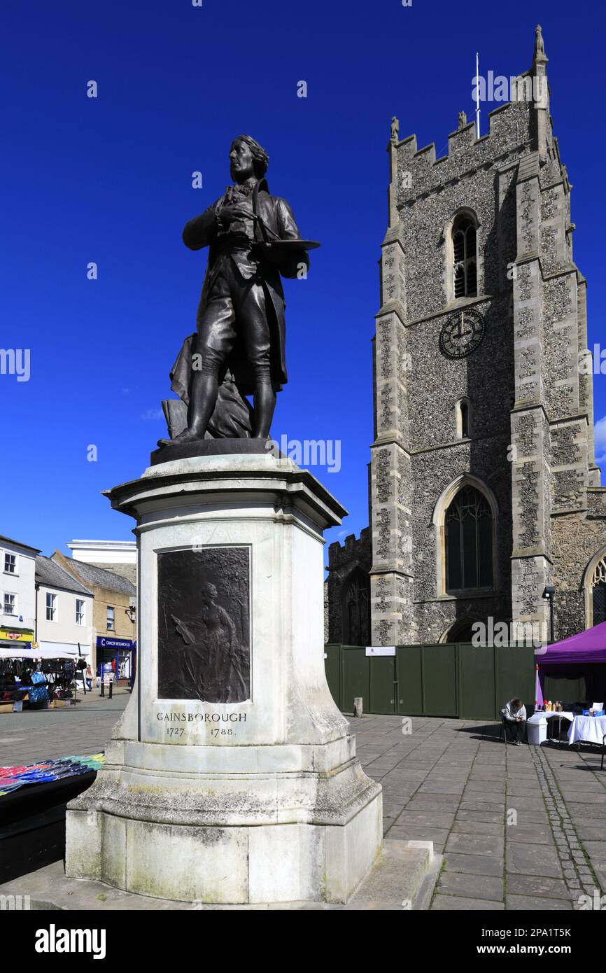 Statue of Suffolk artist Thomas Gainsborough and St Peters church