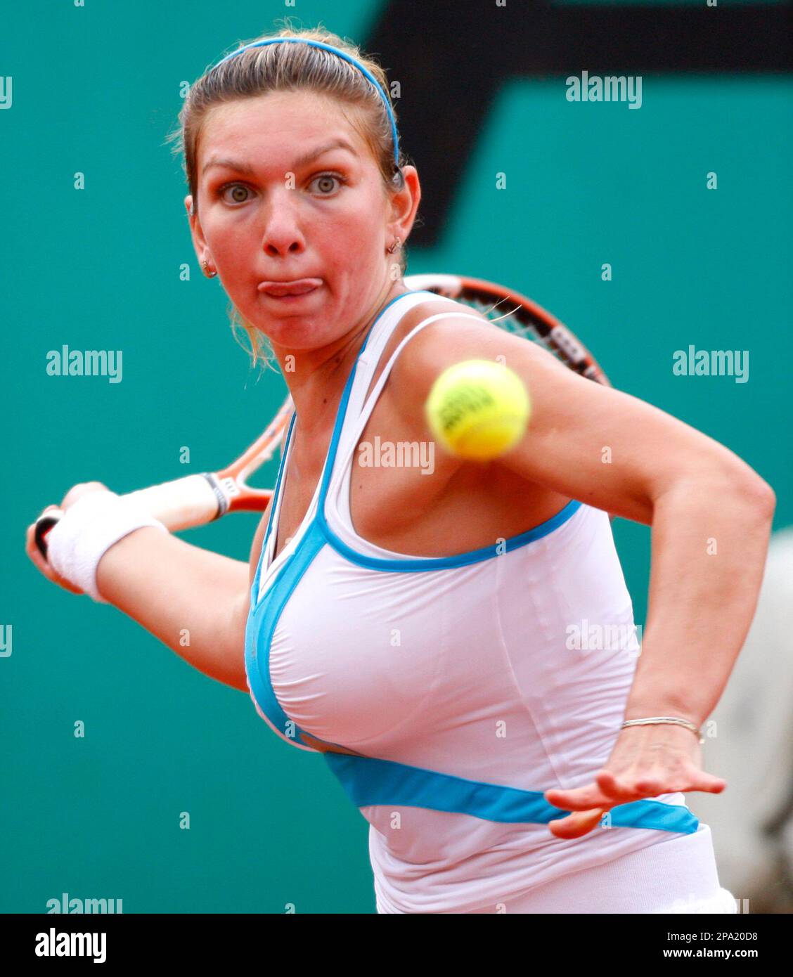 Romania's Simona Halep returns the ball to compatriot during the Grils' single final match of the French Open tennis tournament, Sunday, June 8, 2008 at the Roland Garros stadium in Paris. (AP Photo/Laurent Baheux) Stock Photo