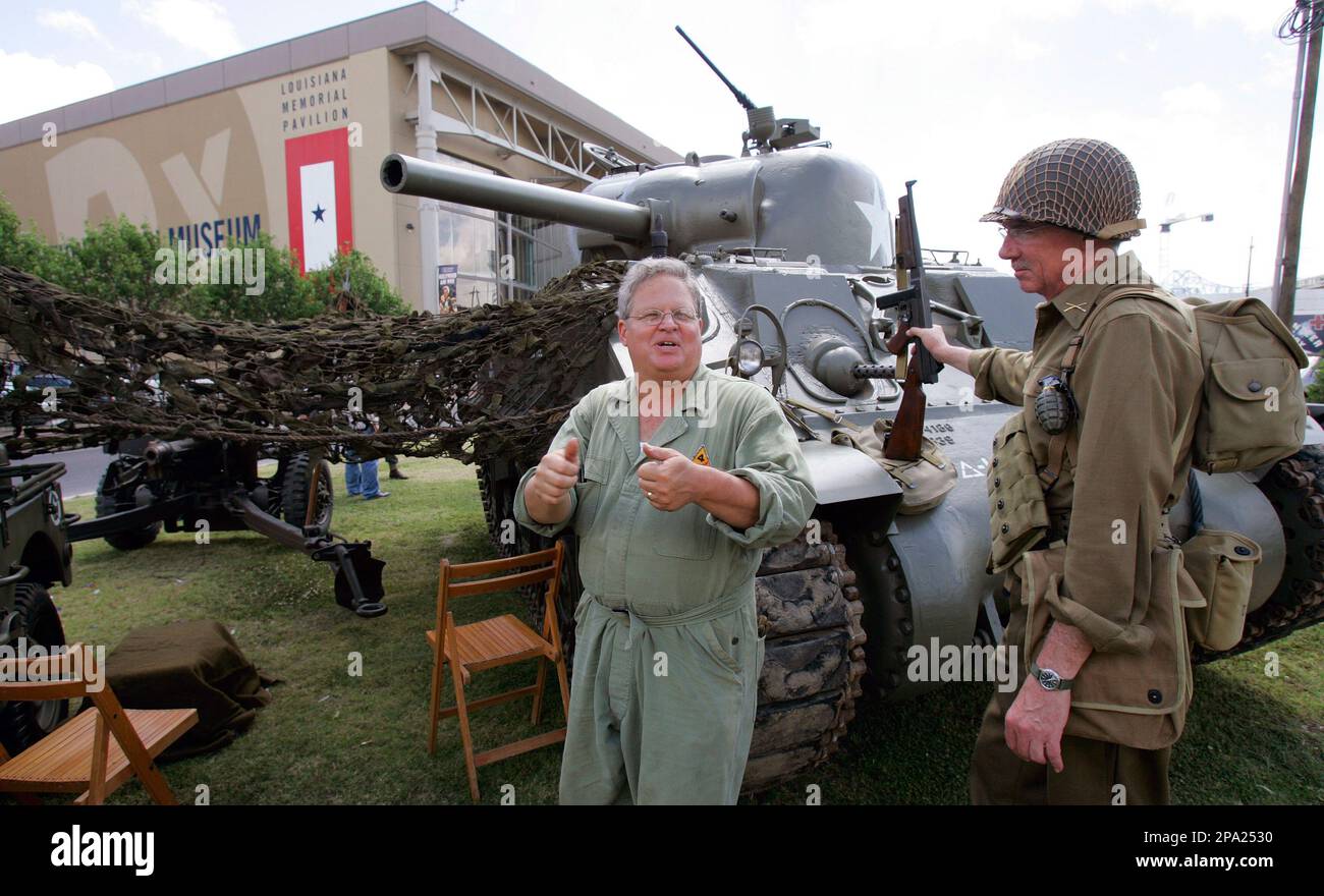 Re-enactors Tom Czekanski, left, and Frank Ratermann man a display set ...