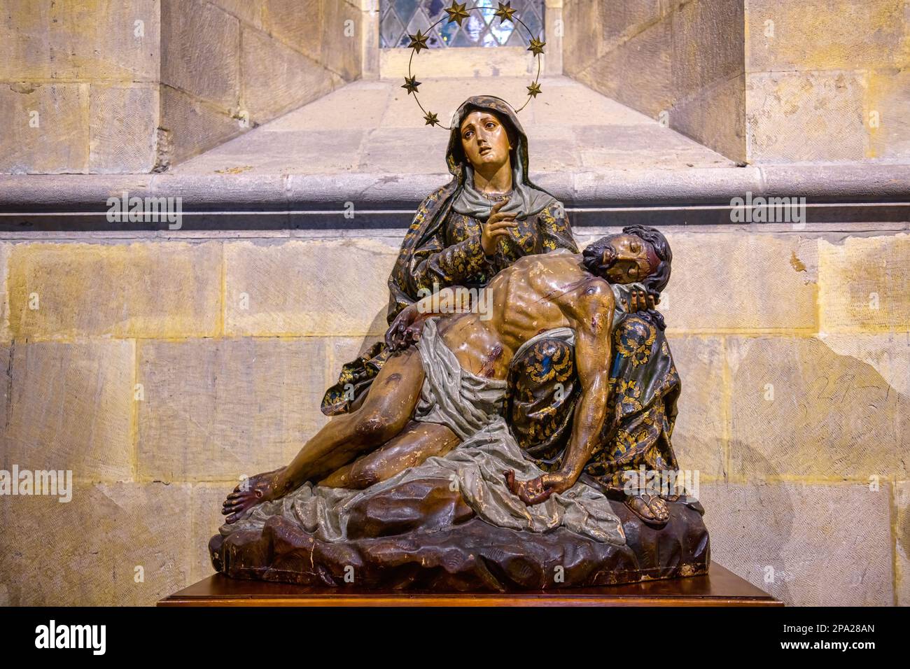 An ancient sculpture or art of Virgin Mary with the body of dead Jesus Christ in her hands. Stock Photo