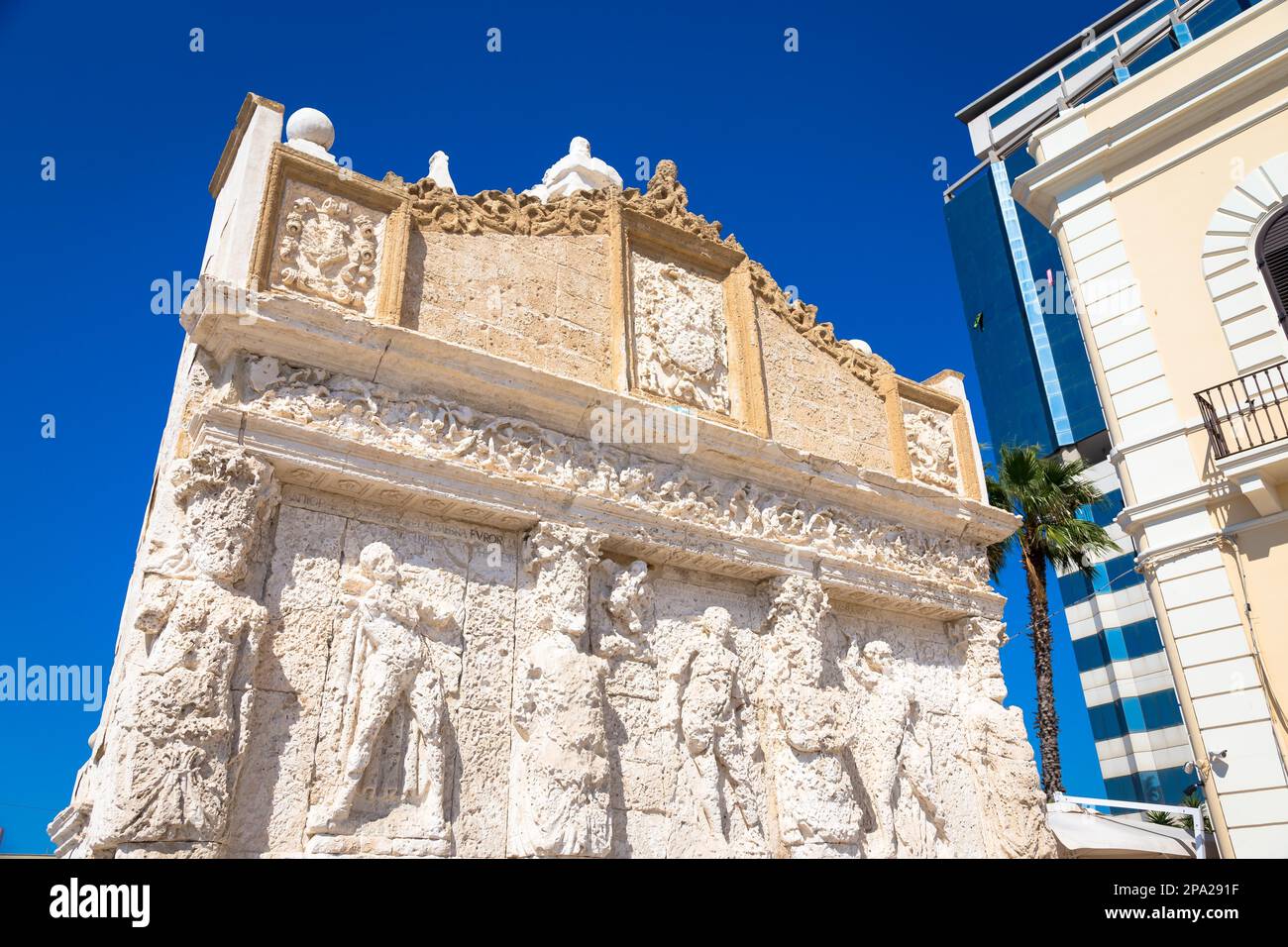 The greek fountain is located in Gallipoli, near the bridge that connects the new town to the old town. This fountain is the oldest in Italy, and is Stock Photo