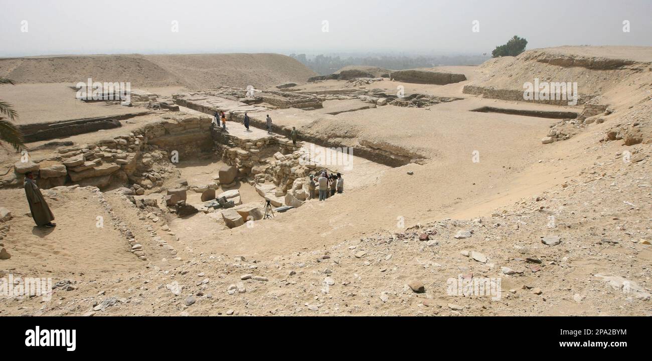 Pyramid Missing Workers are seen at the site of a so-called