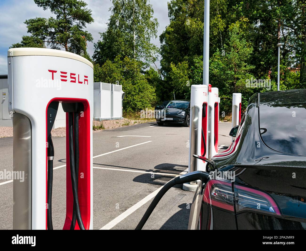 Tesla charging stations for electric vehicles, Supercharger, electric  charging station, Sweden Stock Photo - Alamy