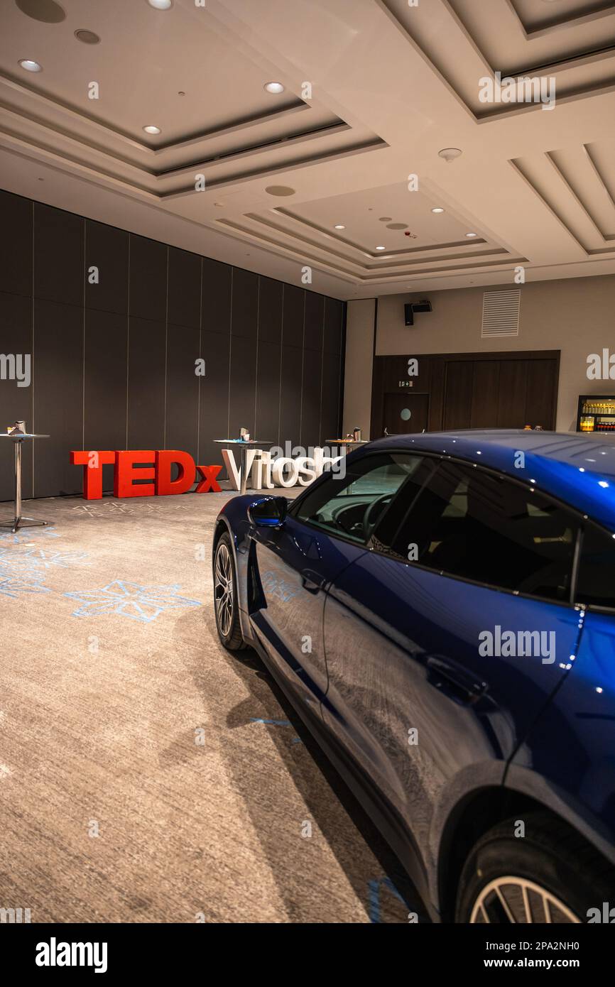Circa 2023 Sofia, Bulgaria A blue shiny new Porsche Tacan car with