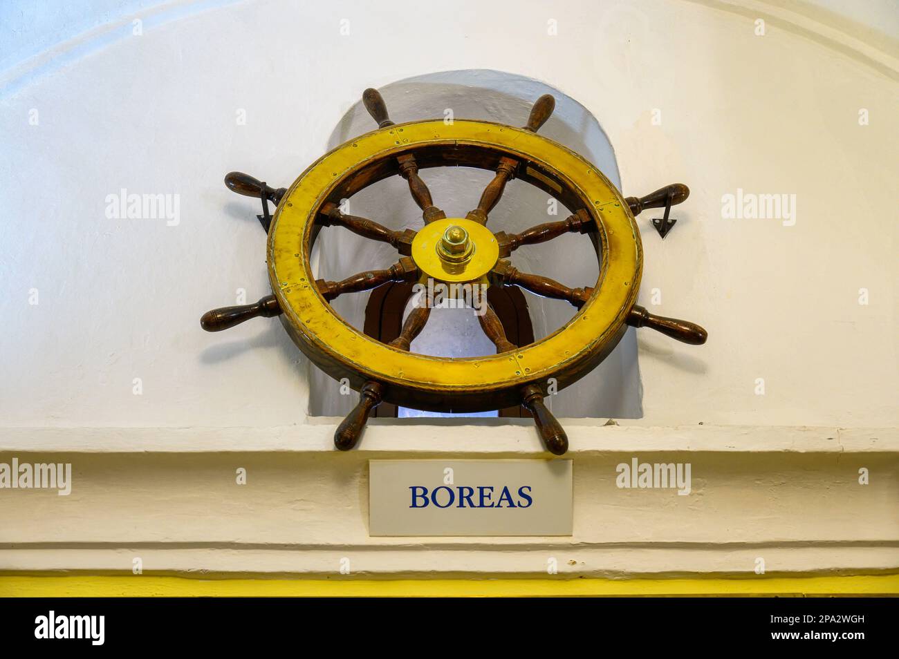 Wooden ship rudder marked with the word Boreas. In Spanish, the