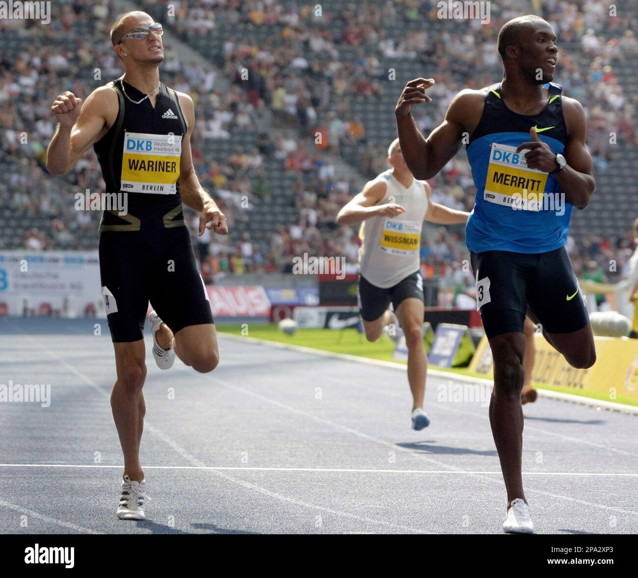 USrunner LaShawn Merritt, right, runs to victory as USsprinter Jeremy