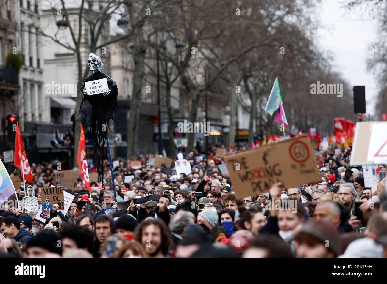 Demonstrators attend a march against the government's pension reform plan in Paris, France, March 11, 2023.  REUTERS/Benoit Tessier Stock Photo