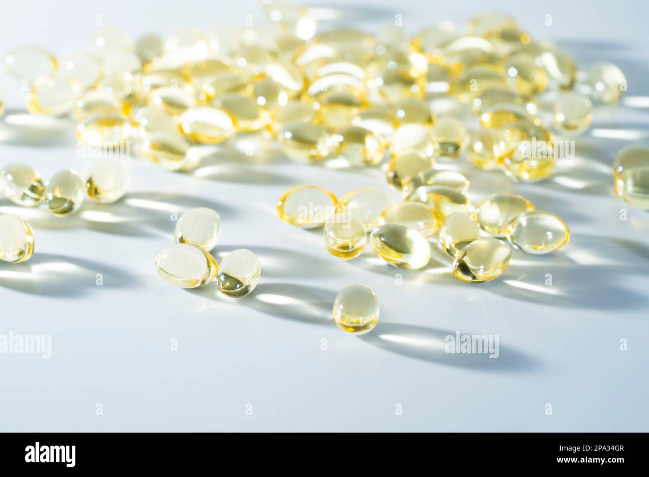 Vitamin D, omega 3, omega 6, Food supplement oil filled fish oil, vitamin A, vitamin E, flaxseed oil. Stock Photo