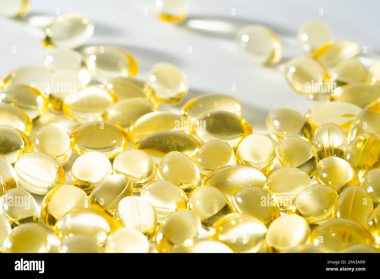 Vitamin D, omega 3, omega 6, Food supplement oil filled fish oil, vitamin A, vitamin E, flaxseed oil. Stock Photo