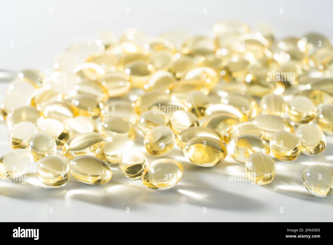 Vitamin D, omega 3, omega 6, Food supplement oil filled fish oil, vitamin A, vitamin E, flaxseed oil. Stock Photo