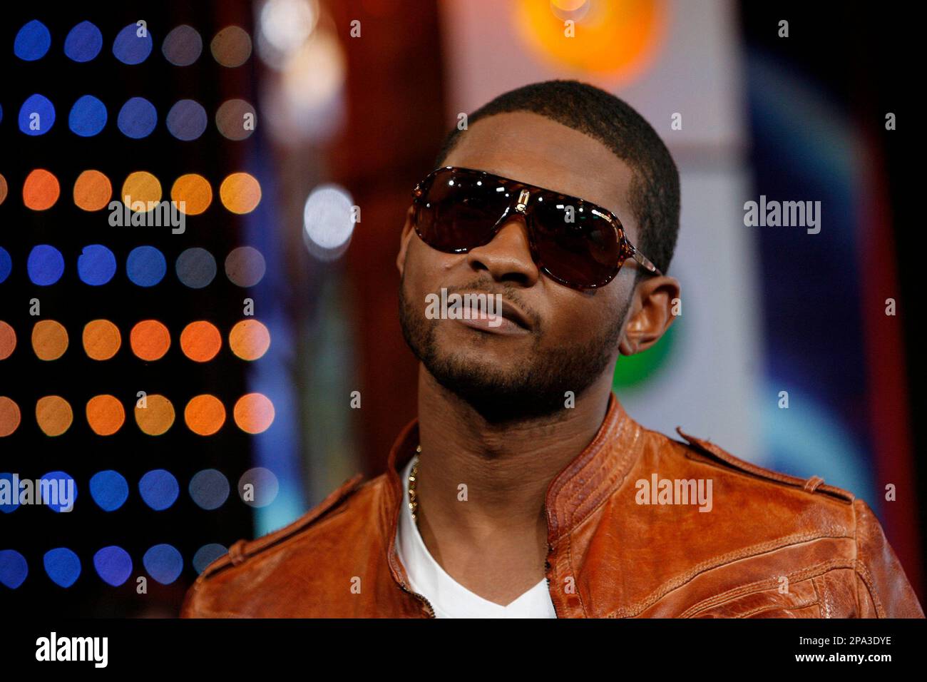 Usher appears onstage during MTV's "Total Request Live" at the MTV