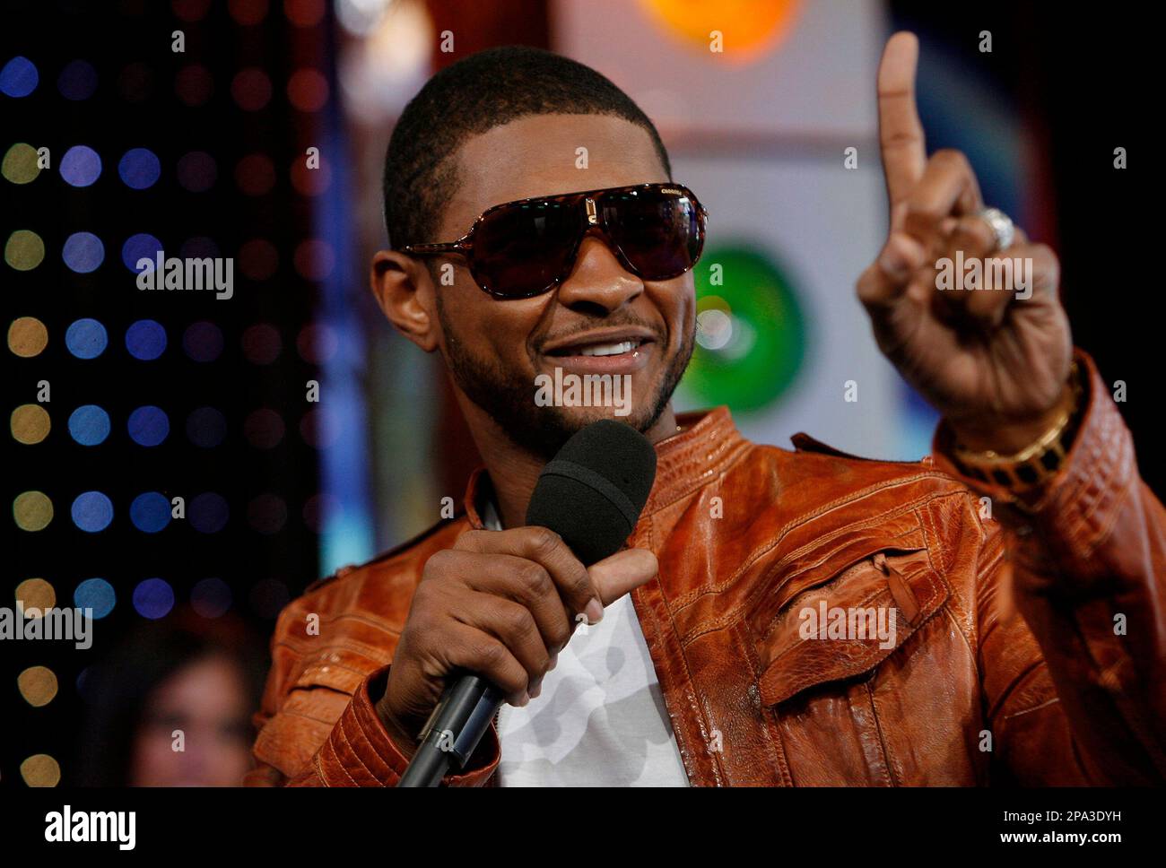 Usher appears onstage during MTV's "Total Request Live" at the MTV