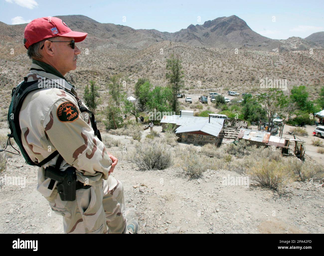 Inyo County Under Sheriff John Eropkin looks out over an abandoned ...