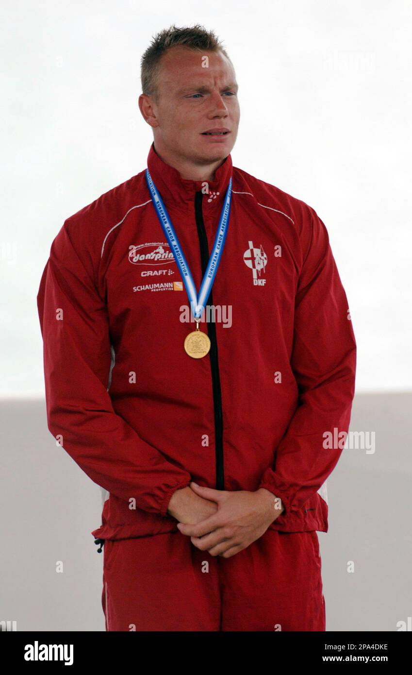 Denmark's Kasper Bleibach celebrates winning the gold medal in the men