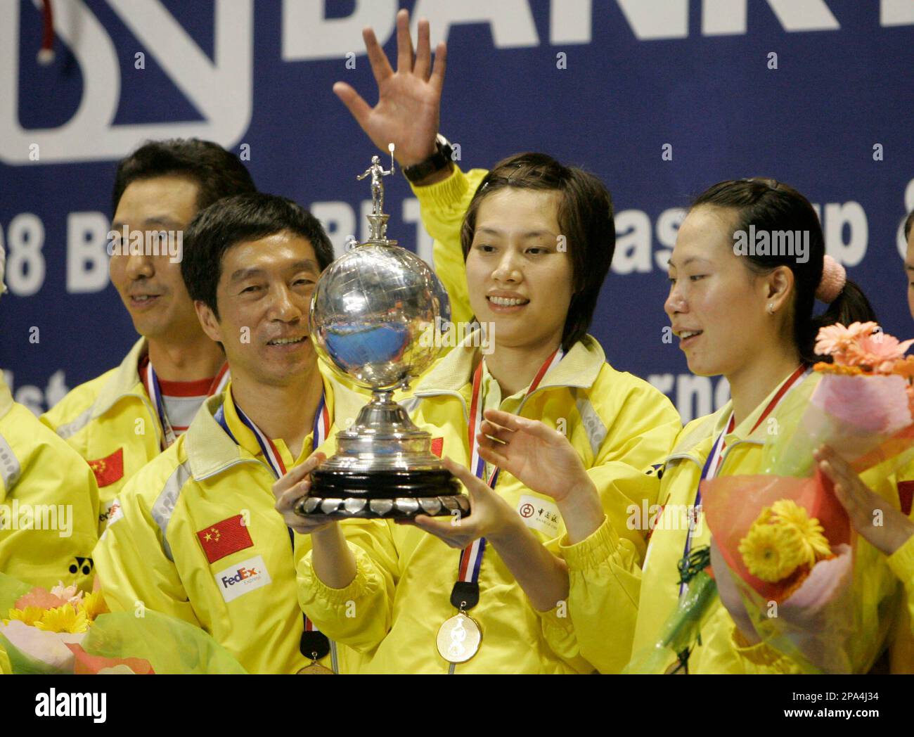Chinas Xie Xinfang holds the Uber Cup trophy after China defeated Indonesia in the Uber Cup badminton championship final at Istora Senayan stadium in Jakarta, Indonesia, Saturday, May 17, 2008