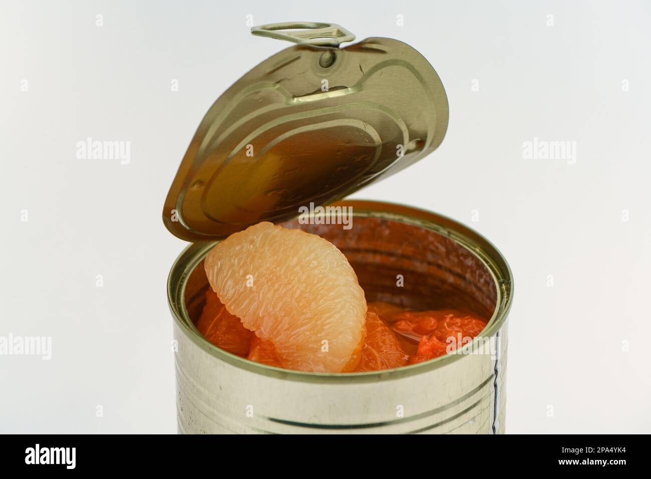 Tinned grapefruit in juice segments hires stock photography and images