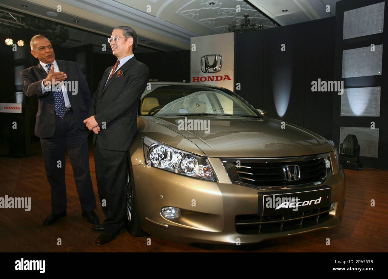 President and CEO Masahiro Takedagawa, right, and Chairman S. Shriram ...