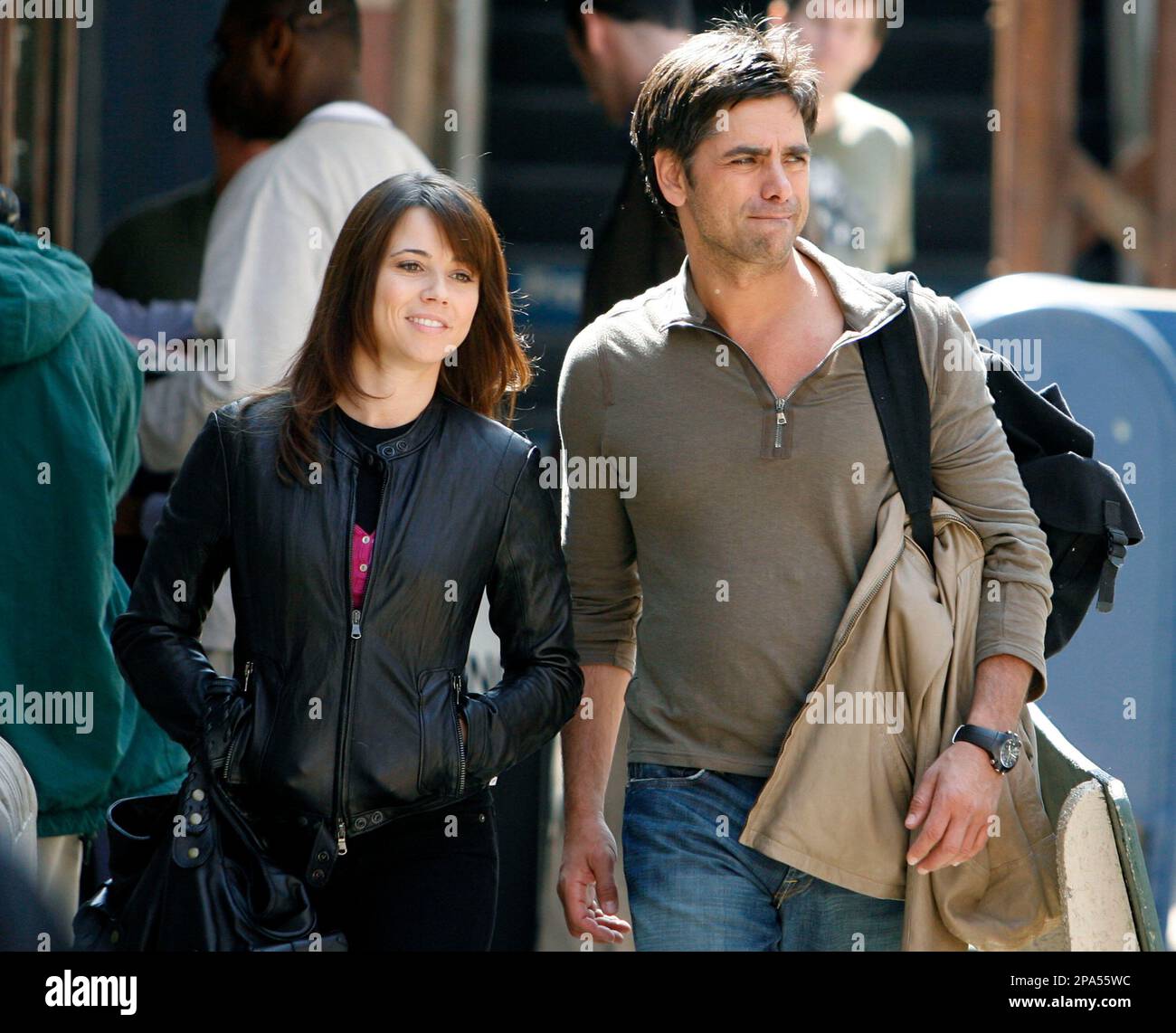 Actors Linda Cardellini, left, and John Stamos are seen while filming an  episode of \, image size:1300x1142