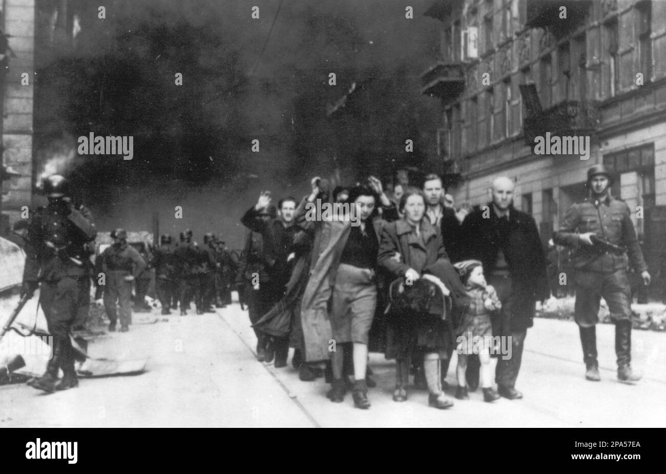 FILE ** In this 1943 file photo, a group of Polish Jews are led away for  deportation by German SS soldiers, in April/May 1943, during the  destruction of the Warsaw Ghetto