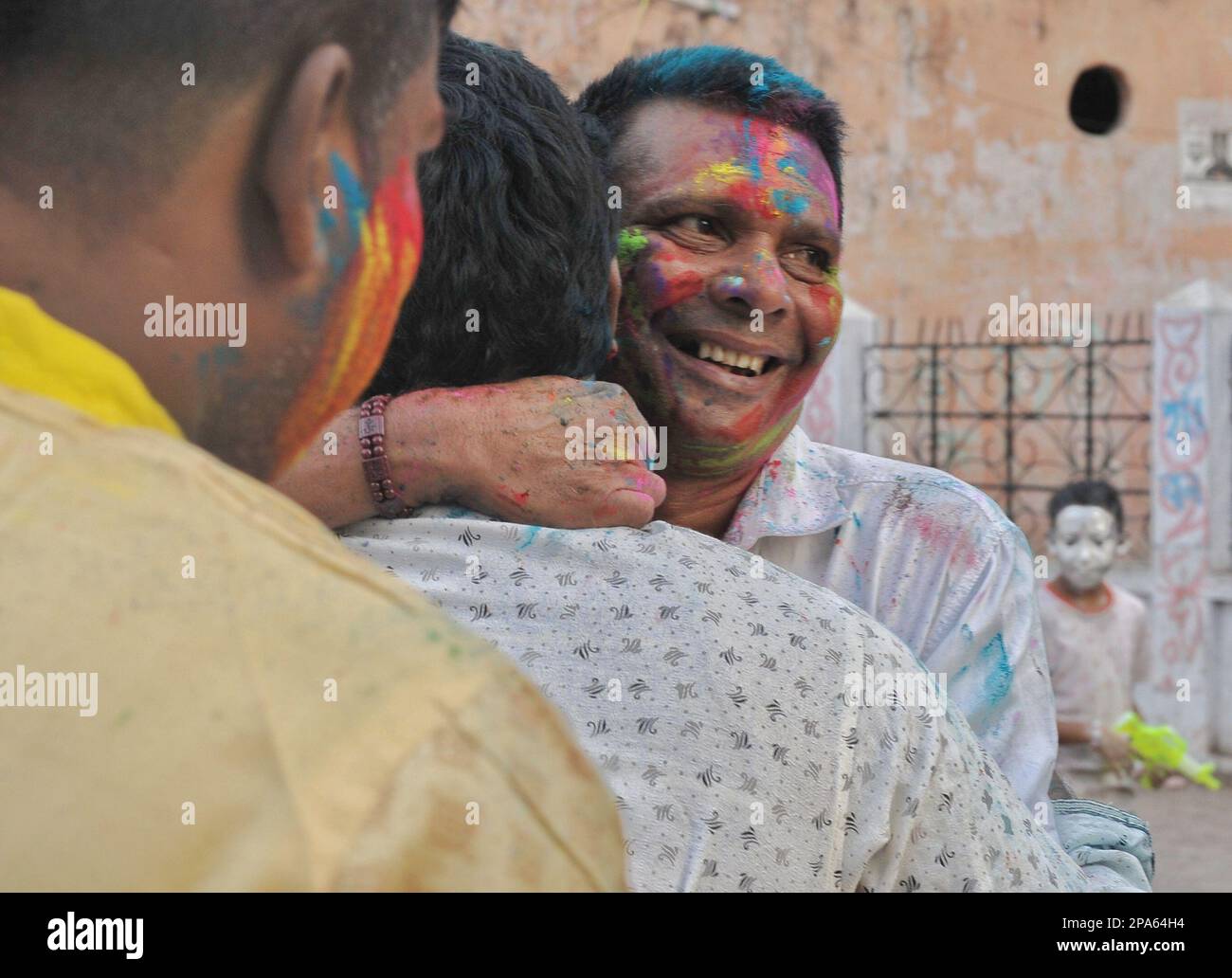Holi celebrations in Dhaka. Holi, also known as the Festival of Colours, Love and Spring, is one of the most popular and significant festivals in Hinduism. It celebrates the eternal and divine love of the god Radha and Krishna. Dhaka, Bangladesh. Stock Photo