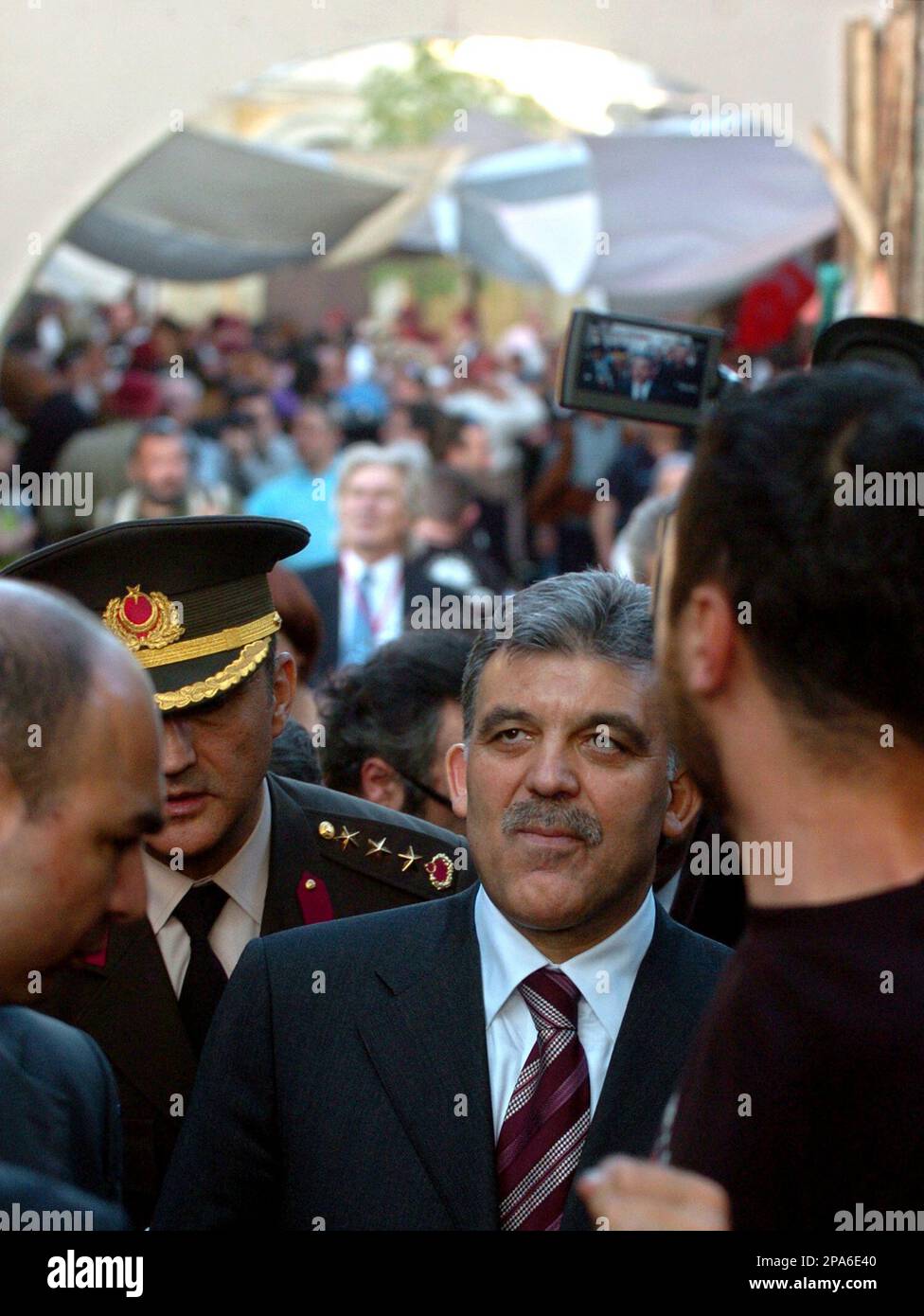 Turkish President Abdullah Gul, center, is seen during his visit to a set  of the Turkish TV serial Farewell Rumelli, in the southern Macedonia's town  of Bitola on Thursday, May 1, 2008,