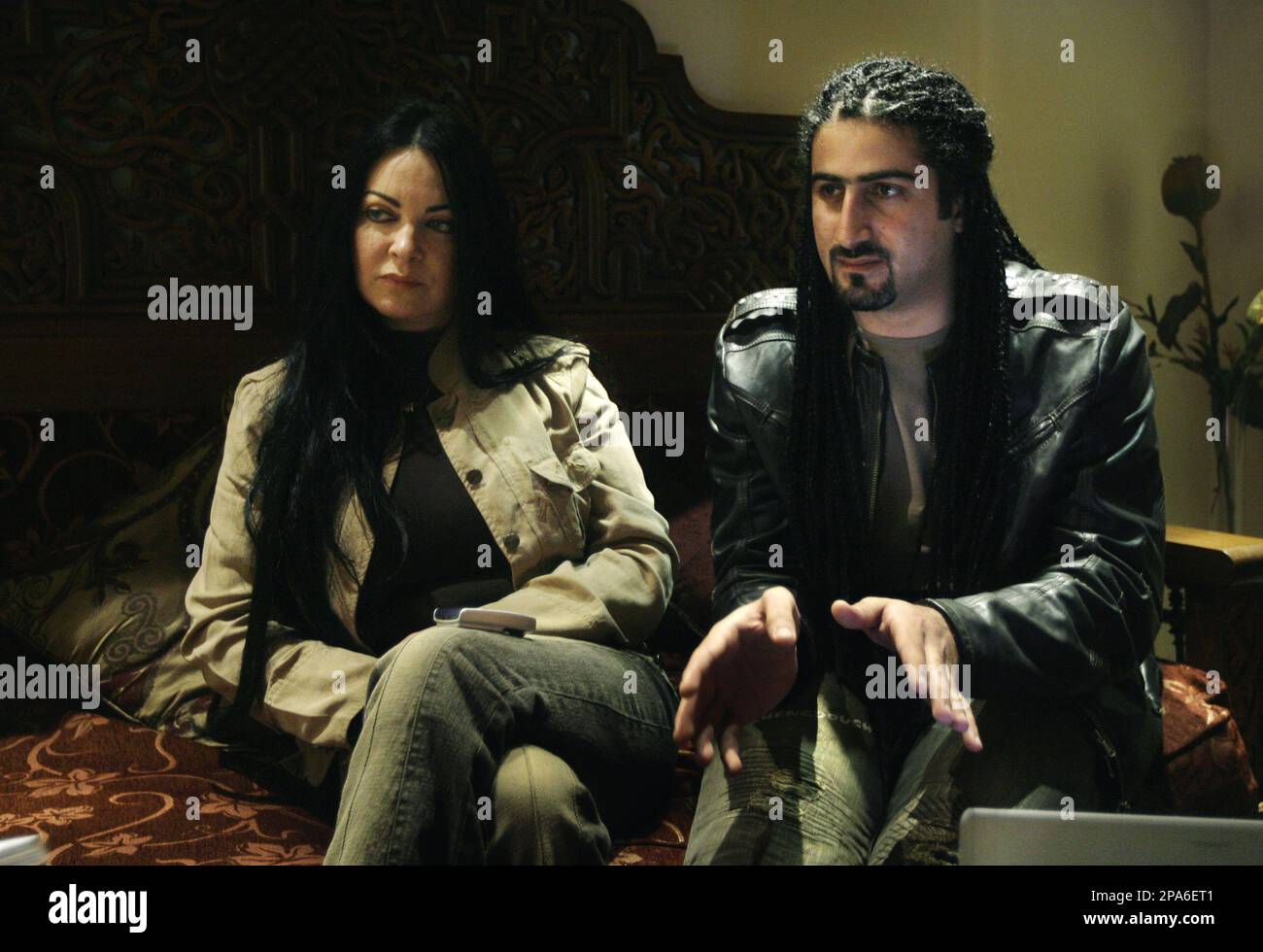 FILE ** In this Jan. 11, 2008 file photo, Omar Osama bin Laden, right, and  his British-born wife Jane Felix-Brown, now known as Zaina Alsabah, 52,  speak during an interview with, image size:1300x980