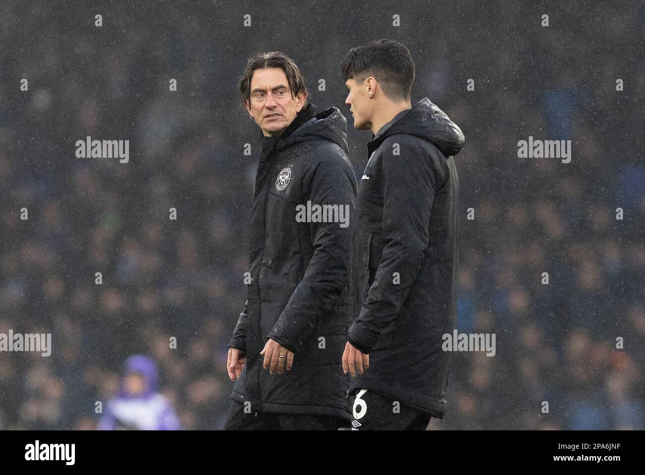 Thomas Frank manager of Brentford talks with Christian Norgaard #6 of Brentford after the Premier League match Everton vs Brentford at Goodison Park, Liverpool, United Kingdom, 11th March 2023  (Photo by Phil Bryan/News Images) Stock Photo