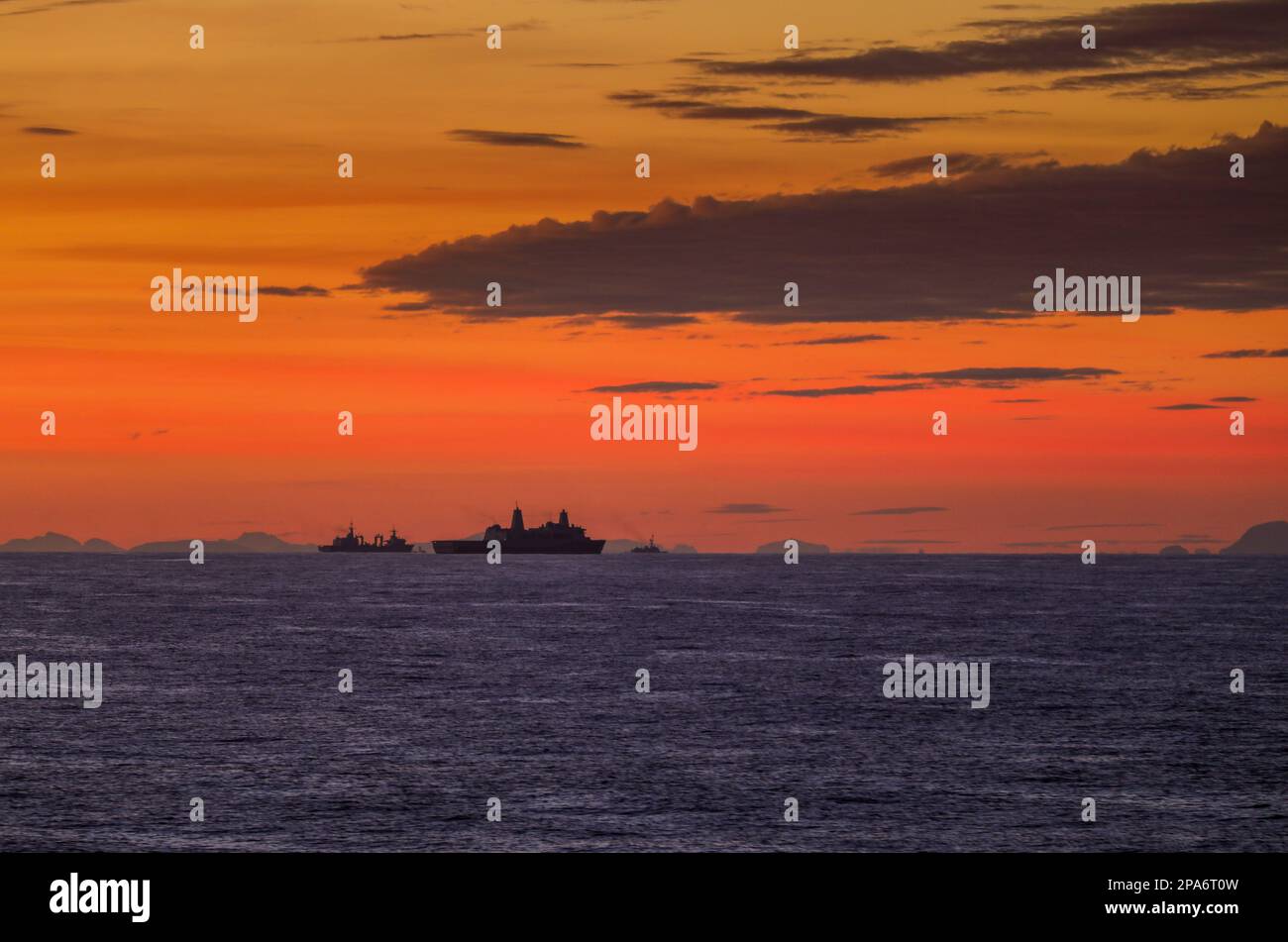 USS New York in company with other warships in the Norwegian Sea Stock Photo