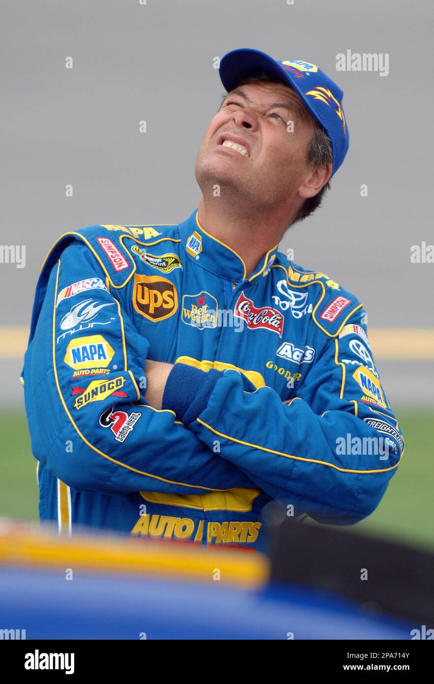 NASCAR driver Michael Waltrip waits before qualifying for Sunday's
