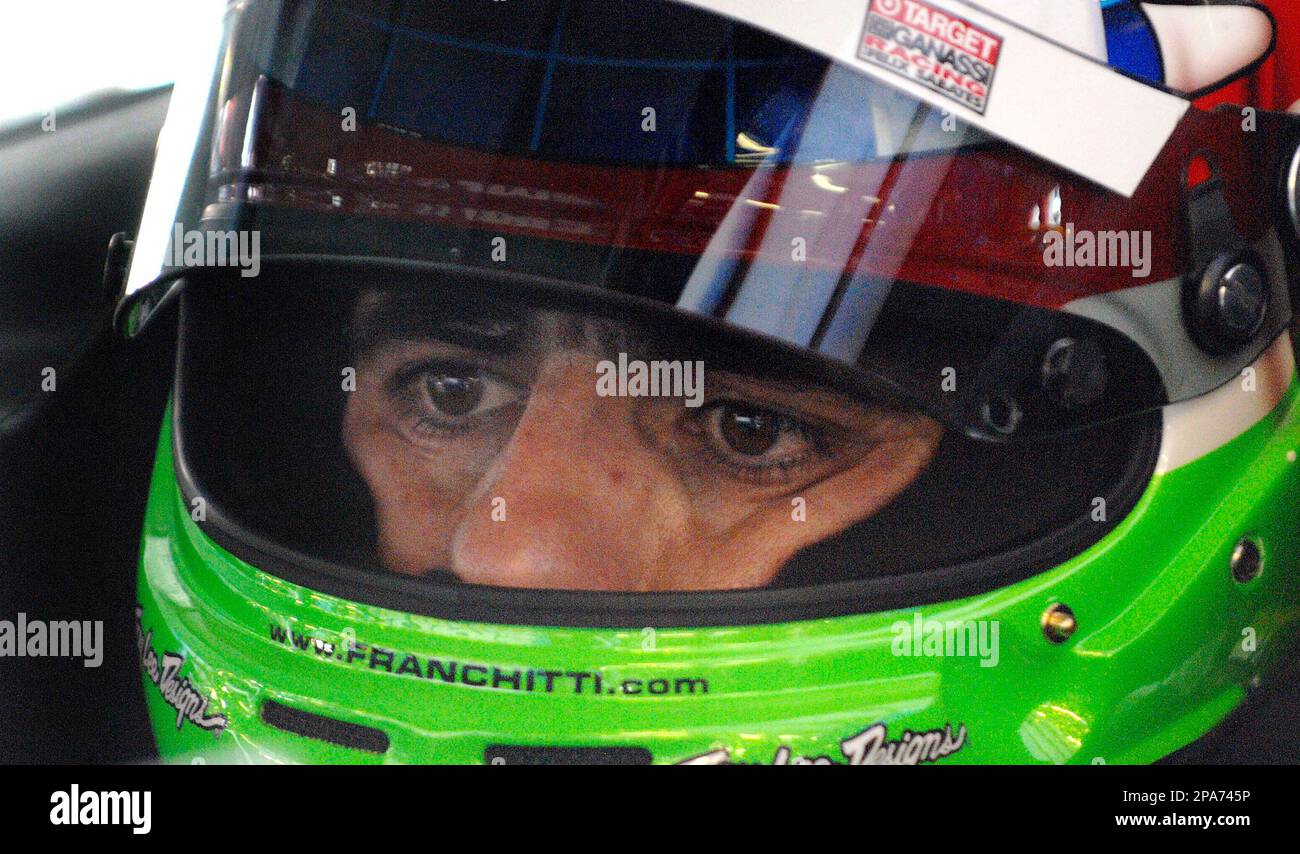 NASCAR driver Dario Franchitti prepares to practice for Sunday's Aaron