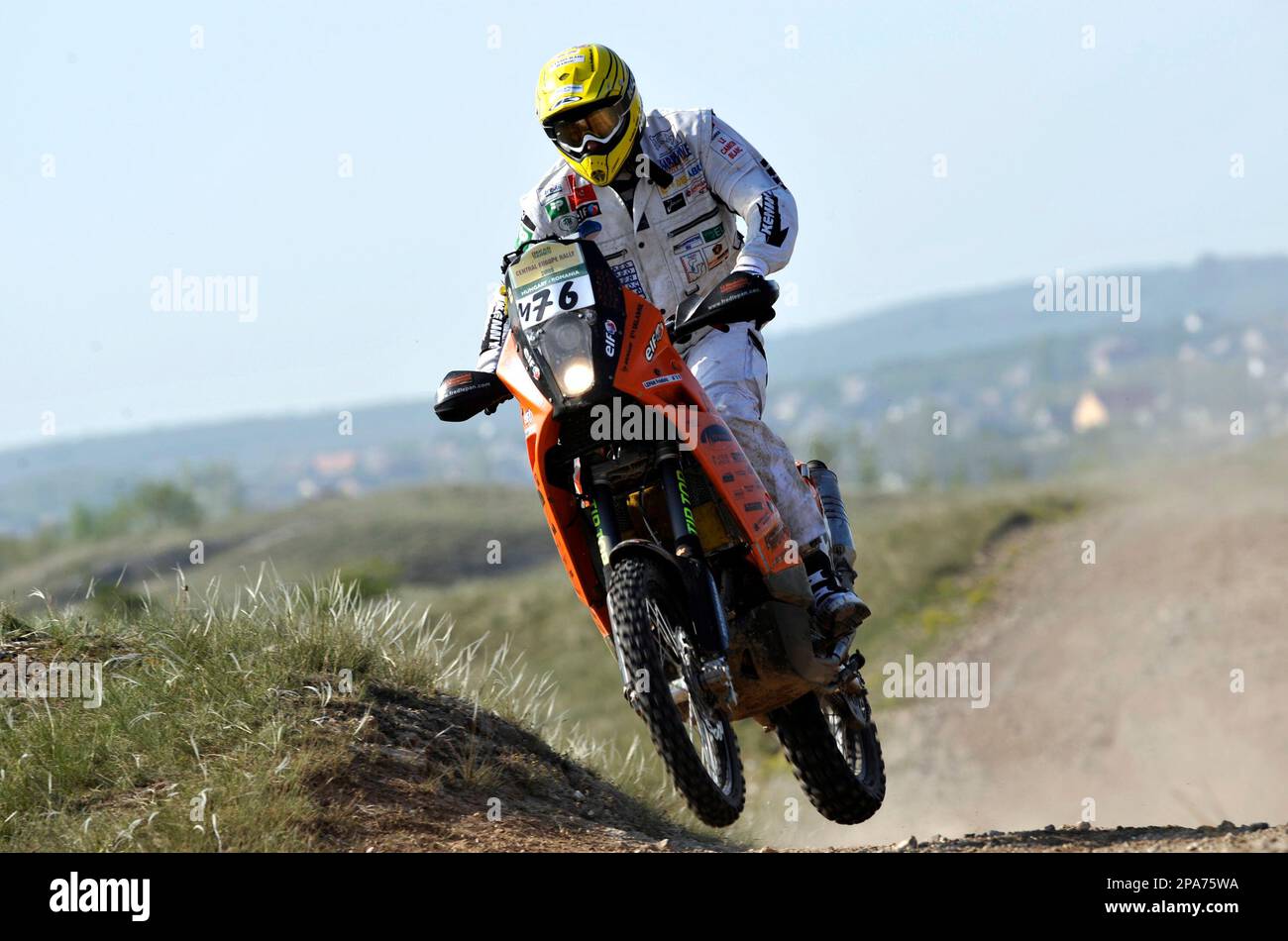 France's Frederic Lepan of the Aventure Moto Sport Team jumps with his bike  during the 6A special stage of the Central Europe Rally near Oeskue, 110 km  (68 miles) southwest of Budapest,