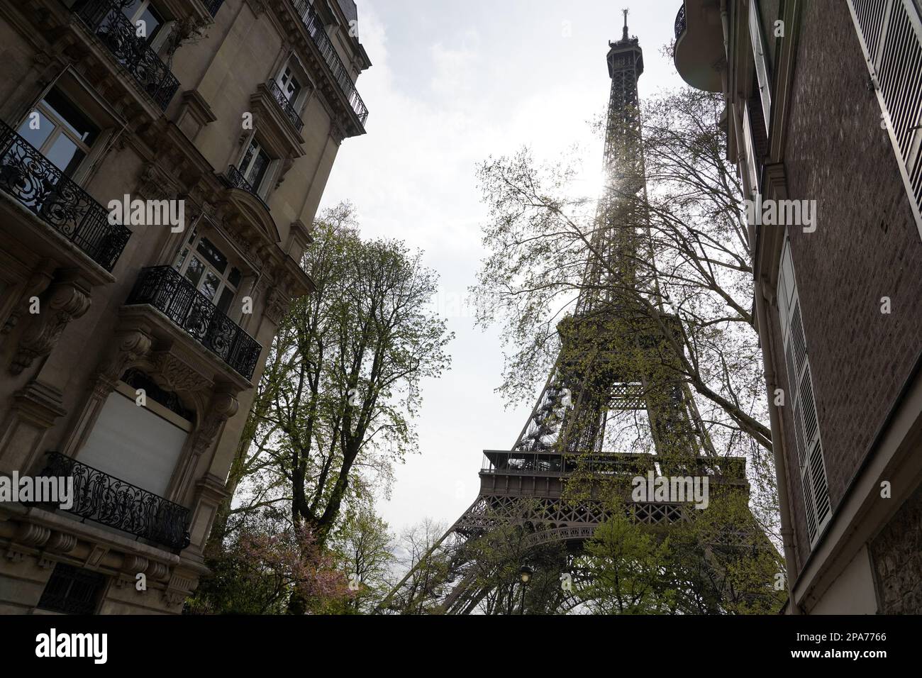 Eiffel Tower seen from Avenue de la Bourdonnais, septième arrondissement, Paris, France Stock Photo